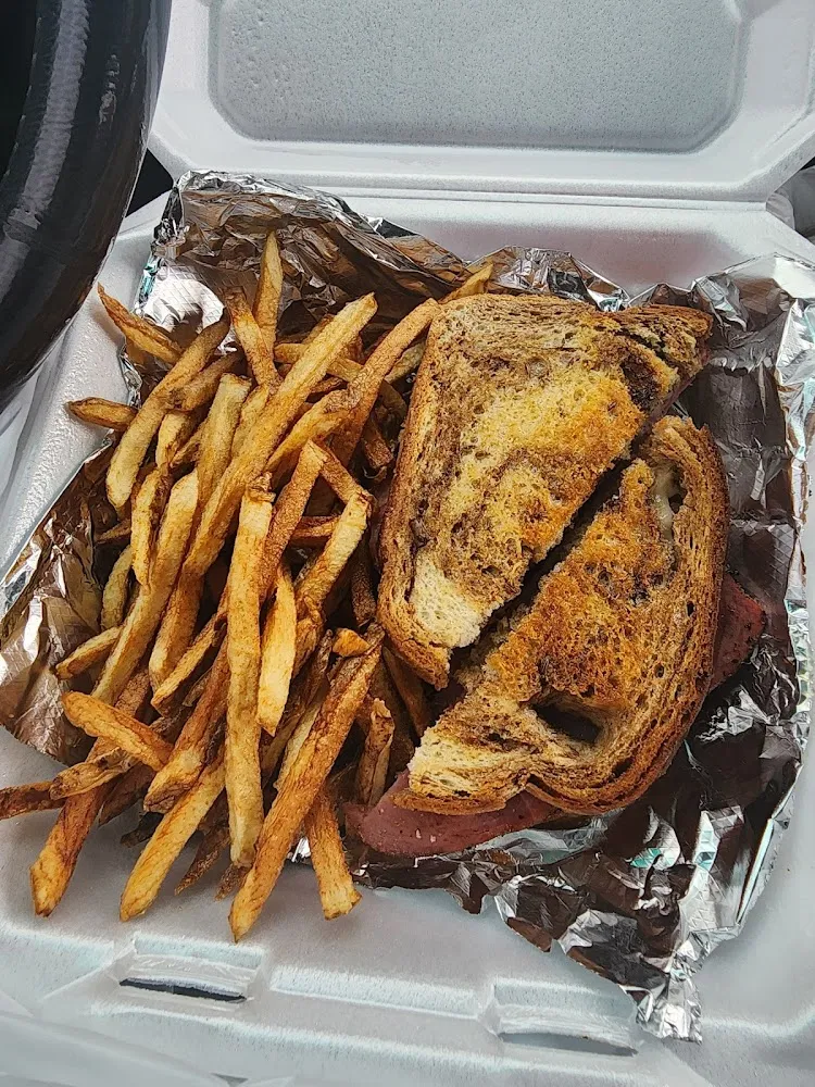 Pastrami and Swiss Sandwich with Fries
